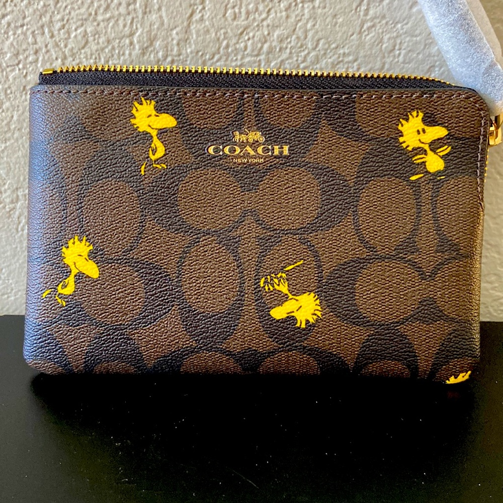 Coach X Peanuts Corner zip wristlet Woodstock